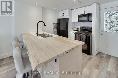 2482 Snowhill Court, Burlington, ON - Indoor Photo Showing Kitchen With Double Sink