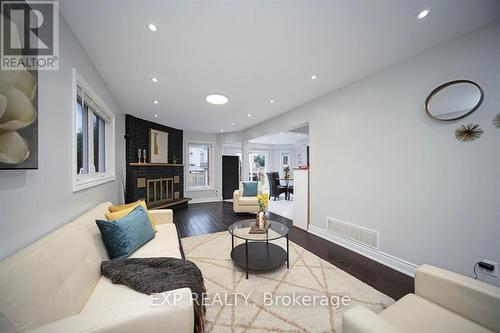 692 Huntington Ridge Drive, Mississauga, ON - Indoor Photo Showing Living Room With Fireplace