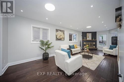 692 Huntington Ridge Drive, Mississauga, ON - Indoor Photo Showing Living Room With Fireplace