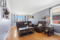 Hardwood flooring throughout the living area - 