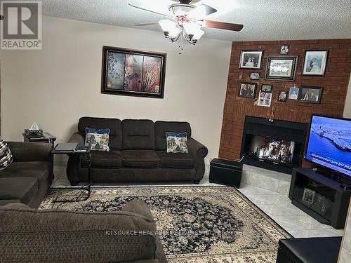 3546 Italia Crescent, Mississauga, ON - Indoor Photo Showing Living Room With Fireplace