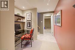 Dedicated workstation featuring built-in shelving and recessed lighting - 