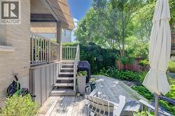 two level deck with low maintenance gardening - 