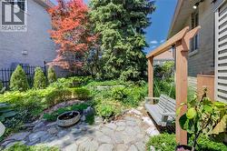 Relaxing swing with stone no mow back yard - 