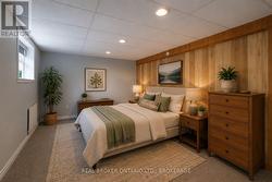 Virtually Staged Lower Level Bedroom, current Den. - 