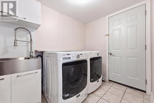 Main floor laundry & entry to garage - 17 White Crescent, Barrie, ON - Indoor Photo Showing Laundry Room