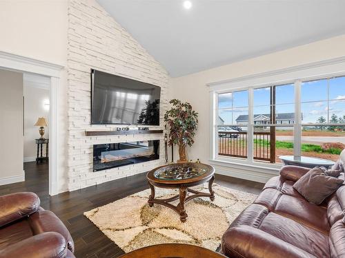 29 Laughlin Street, Miscouche, PE - Indoor Photo Showing Living Room With Fireplace