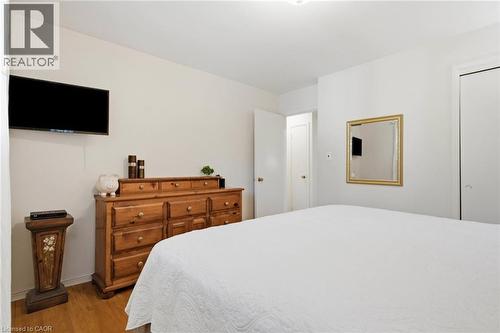 Room featuring light wood-finish flooring, white walls, and a recessed ceiling light fixture - 11 Summit Crescent, Guelph, ON - Indoor Photo Showing Bedroom