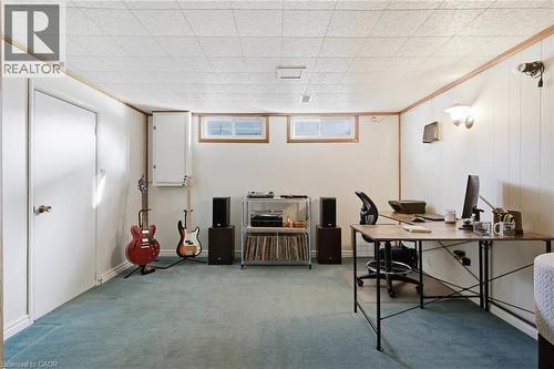 Carpeted room featuring white paneled walls with wood trim - 11 Summit Crescent, Guelph, ON - Indoor Photo Showing Office