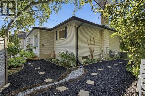 White brick exterior with dark trim and shutters - 11 Summit Crescent, Guelph, ON - Outdoor