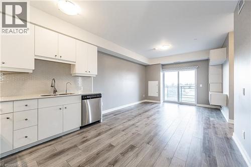 255 Northfield Drive E Unit# 302, Waterloo, ON - Indoor Photo Showing Kitchen With Double Sink