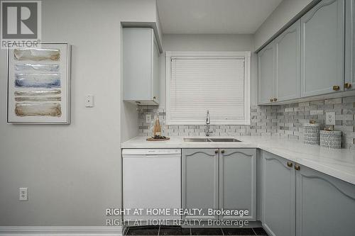 1724 Samuelson Circle, Mississauga, ON - Indoor Photo Showing Kitchen With Double Sink
