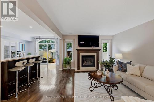 355 Celtic Ridge Crescent, Ottawa, ON - Indoor Photo Showing Living Room With Fireplace