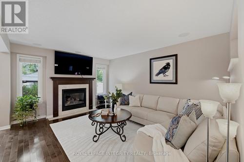 355 Celtic Ridge Crescent, Ottawa, ON - Indoor Photo Showing Living Room With Fireplace