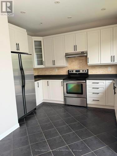 697 Scott Boulevard, Milton, ON - Indoor Photo Showing Kitchen With Stainless Steel Kitchen