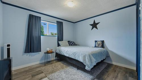 9694 School Road, Coldstream, BC - Indoor Photo Showing Bedroom