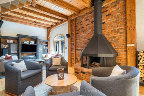 22 Newton Way, Clearview, ON - Indoor Photo Showing Living Room With Fireplace