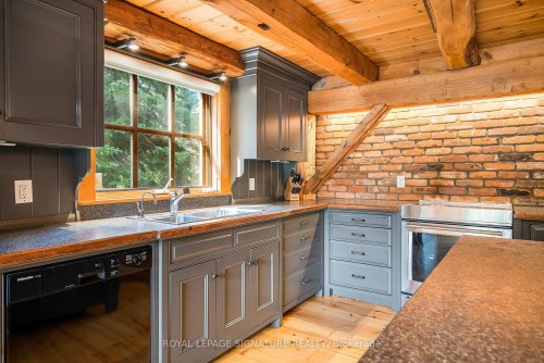 22 Newton Way, Clearview, ON - Indoor Photo Showing Kitchen With Fireplace With Double Sink