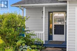 Covered porch welcomes you home - 
