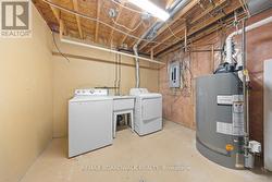 Laundry / Utility room with tons of storage - 