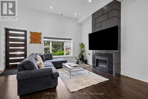 30 Maple Avenue N, Mississauga, ON - Indoor Photo Showing Living Room With Fireplace