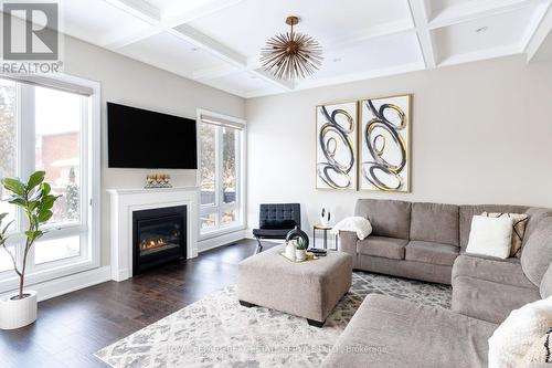 175 Burloak Drive W, Oakville, ON - Indoor Photo Showing Living Room With Fireplace