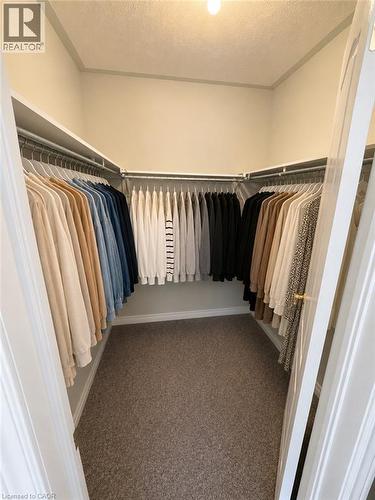 Walk-in closet - 7 Spitfire Drive, Mount Hope, ON - Indoor With Storage