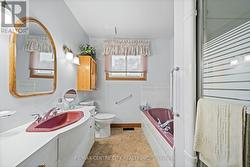 Large bathroom with separate bath and shower - 