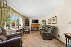 Spacious living with gas fireplace - 