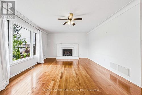21 Moss Boulevard, Hamilton, ON - Indoor Photo Showing Living Room With Fireplace