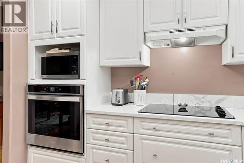 104 303 5Th Avenue N, Saskatoon, SK - Indoor Photo Showing Kitchen
