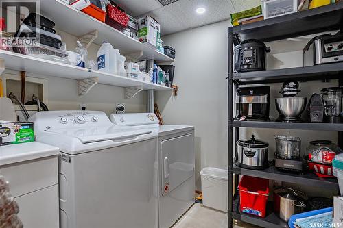 104 303 5Th Avenue N, Saskatoon, SK - Indoor Photo Showing Laundry Room