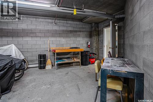 104 303 5Th Avenue N, Saskatoon, SK - Indoor Photo Showing Garage