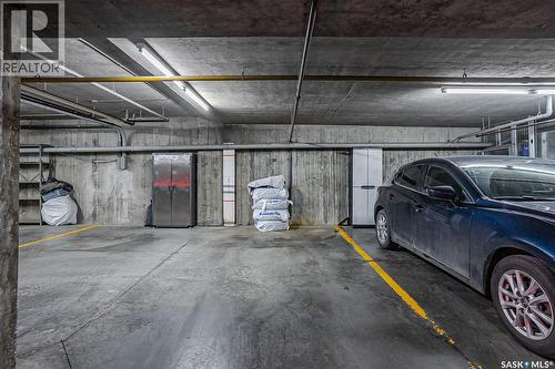 104 303 5Th Avenue N, Saskatoon, SK - Indoor Photo Showing Garage