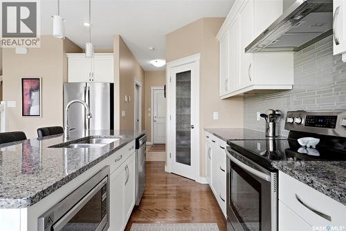 4665 Skinner Crescent, Regina, SK - Indoor Photo Showing Kitchen With Double Sink With Upgraded Kitchen