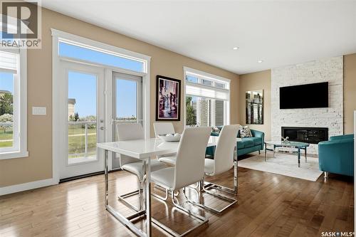 4665 Skinner Crescent, Regina, SK - Indoor Photo Showing Dining Room With Fireplace