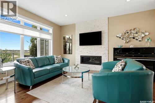 4665 Skinner Crescent, Regina, SK - Indoor Photo Showing Living Room With Fireplace