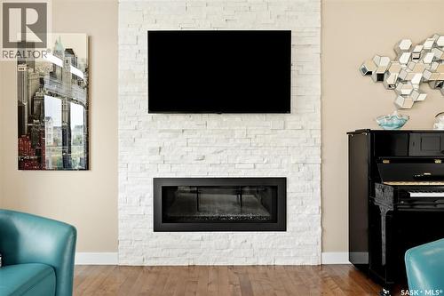 4665 Skinner Crescent, Regina, SK - Indoor Photo Showing Living Room With Fireplace