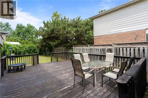 Expansive wooden deck featuring multiple levels and dark wood railings - 383 Bartley Bull Parkway, Brampton, ON - Outdoor With Deck Patio Veranda With Exterior