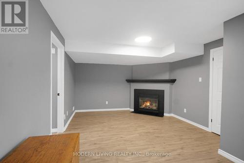 Family Room - 109 Deercroft Avenue, Ottawa, ON - Indoor With Fireplace