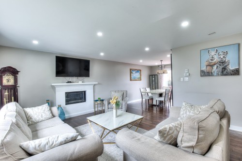 Living Room - 563 Rue Jetté, Laval (Sainte-Dorothée), QC - Indoor Photo Showing Living Room With Fireplace