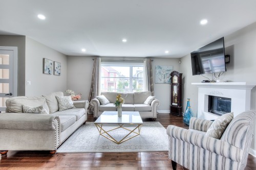 Living Room - 563 Rue Jetté, Laval (Sainte-Dorothée), QC - Indoor Photo Showing Living Room With Fireplace