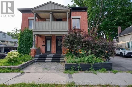 Red brick semi in Lowertown - 300 St Andrew Street, Ottawa, ON - Outdoor With Balcony