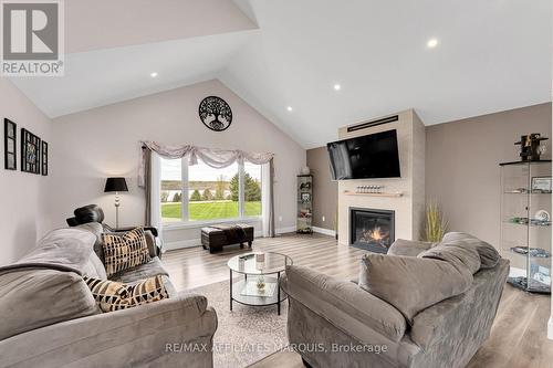 9517 County Road 42 Road, Rideau Lakes, ON - Indoor Photo Showing Living Room With Fireplace