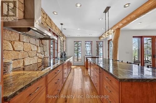 Ceran Stove top & light fix from Hubberton Forge - 12 Walker Road, Tiny, ON - Indoor Photo Showing Kitchen