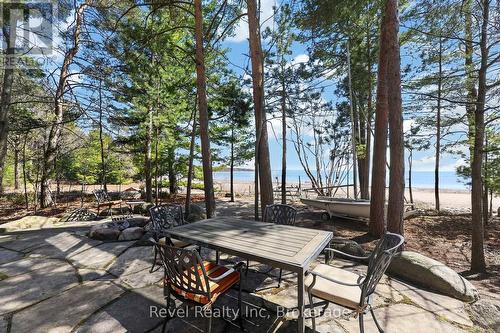 overlooking the bay - 12 Walker Road, Tiny, ON - Outdoor With Body Of Water With Deck Patio Veranda With View