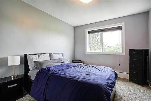 303-23 Lyndale Dr, Winnipeg, MB - Indoor Photo Showing Bedroom