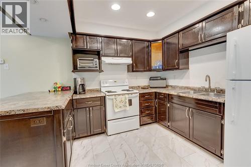 503 Regent, St. Clair Beach, ON - Indoor Photo Showing Kitchen With Double Sink