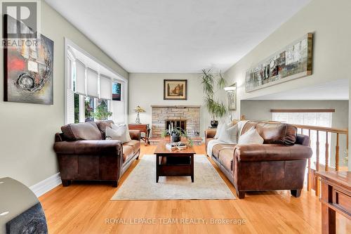 2250 Urbandale Drive, Ottawa, ON - Indoor Photo Showing Living Room With Fireplace