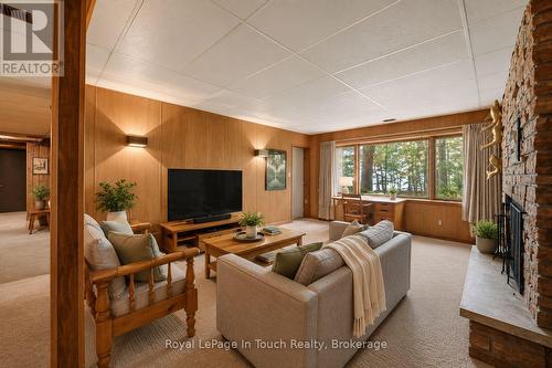 Digitally Staged/Enhanced - 54 Lackie Crescent, Tiny, ON - Indoor Photo Showing Living Room With Fireplace